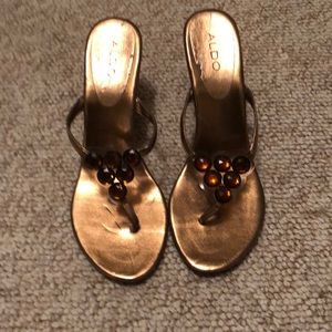 Gold color slipper with heels